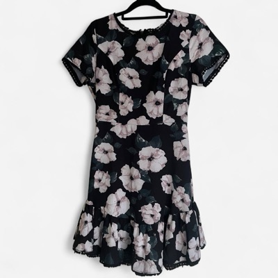 Pilgrim black mini fit and flare floral dress with ruffle hem and Pom Pom trim