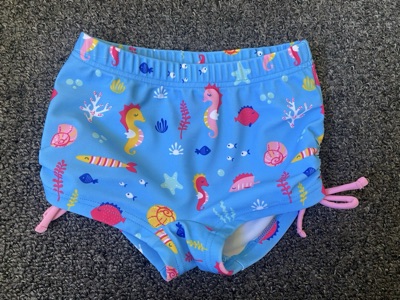Ollie's Place baby swim shorts with sea life print