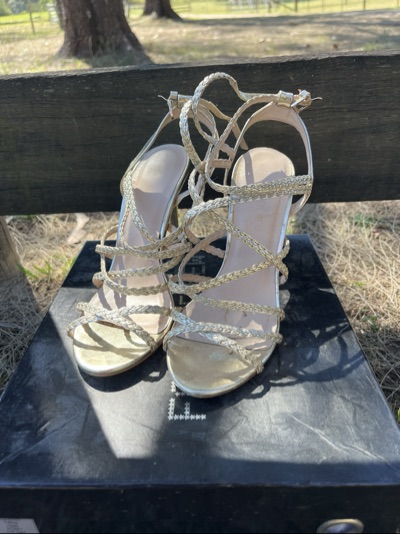 Gold strappy heeled sandals