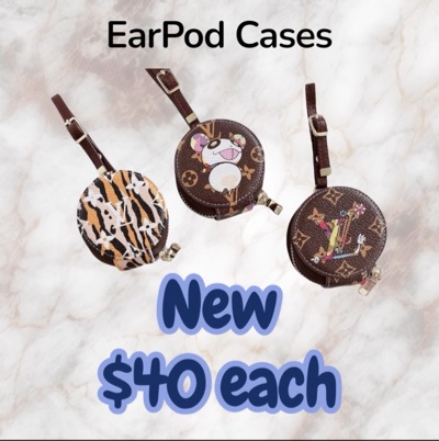 Louis Vuitton round earbud cases with adjustable straps