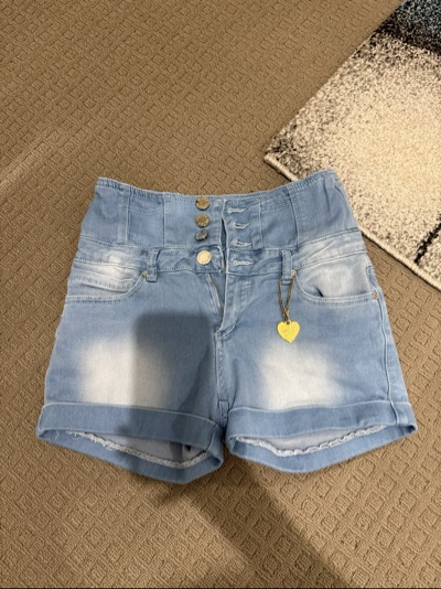 K155 blue denim shorts with rolled cuffs