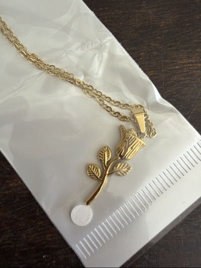 Gold-coloured stainless steel rose pendant necklace