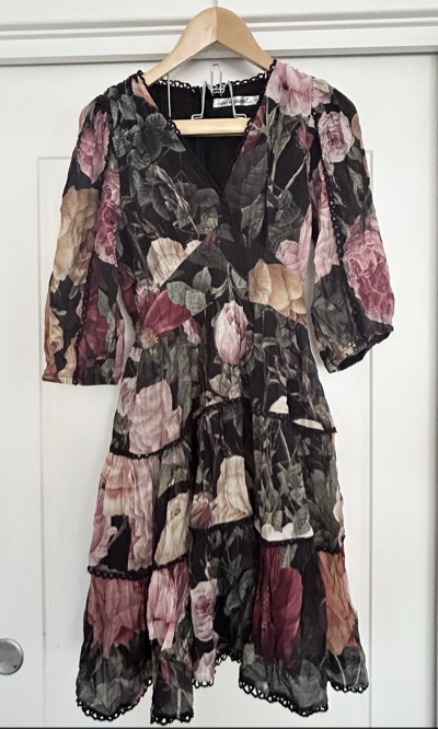 Vine Apparel Black floral dress with pink, beige, and green flowers Size 8