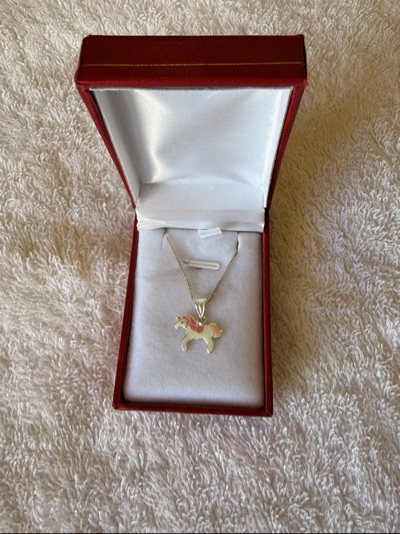 Prouds Sterling Silver 925 unicorn pendant and necklace