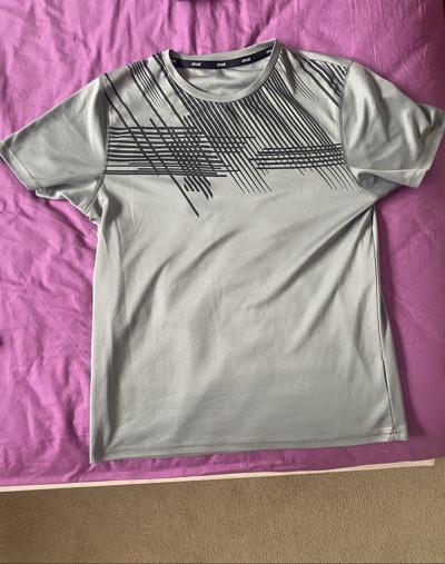 Men’s activewear bundle full of different short sleeved tops and shorts